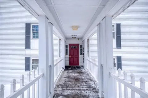 a view of a pathway of a house with window