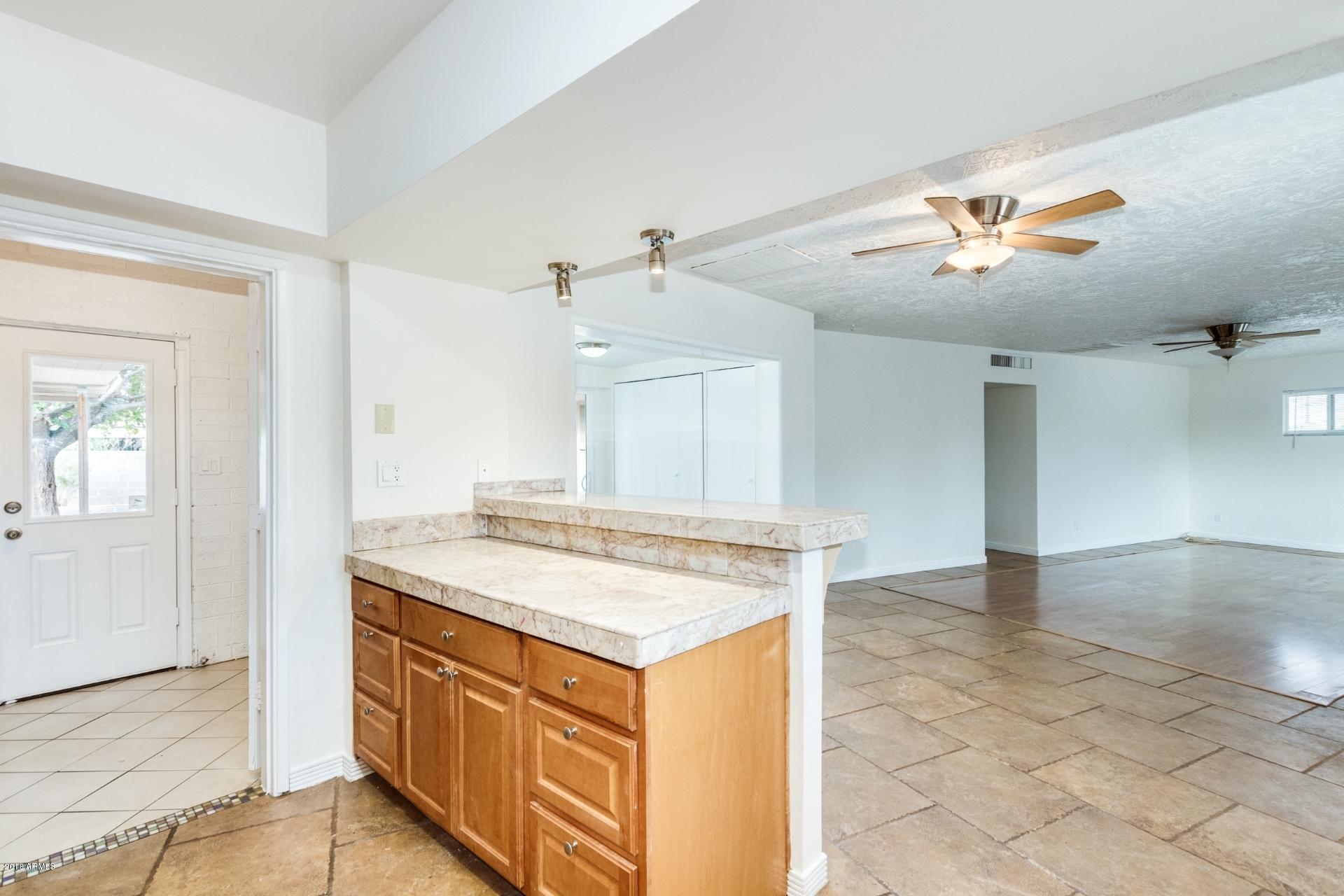 2308 North Power Road Mesa, AZ 85215 - Photo 8 of 22 Kitchen, Dining Area, & Great Room