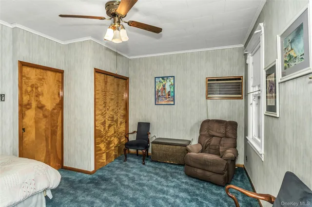 a workspace with wooden floor and a window