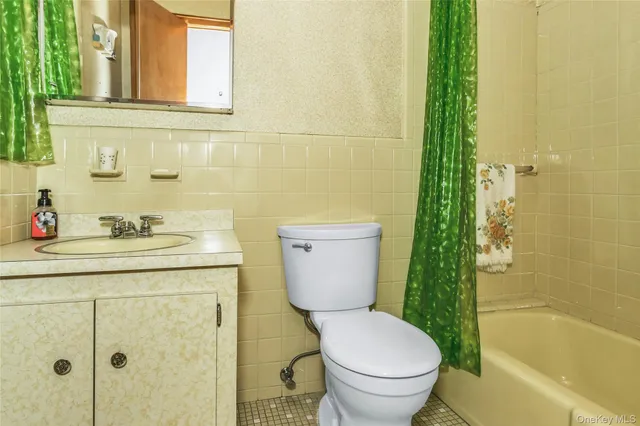 a view of a bathroom from the hallway
