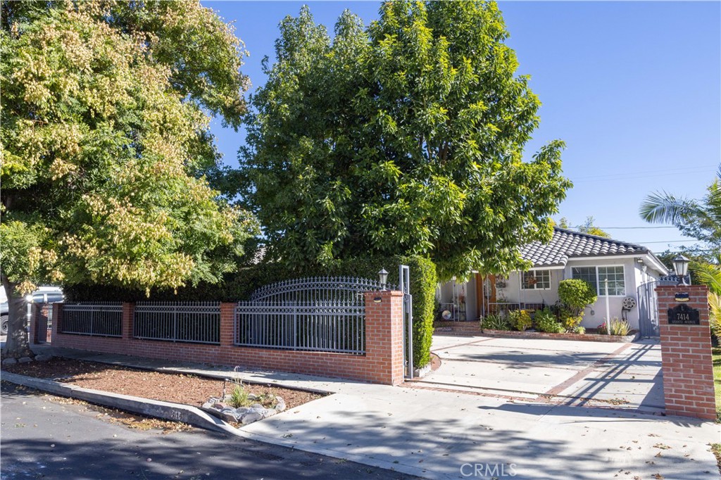 7414 Quartz Avenue Winnetka, CA 91306 - Photo 2 of 42 a view of street along with trees