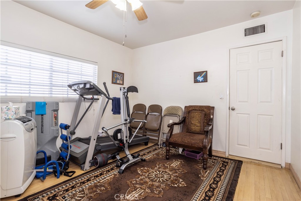 7414 Quartz Avenue Winnetka, CA 91306 - Photo 22 of 42 a view of a room with gym equipment