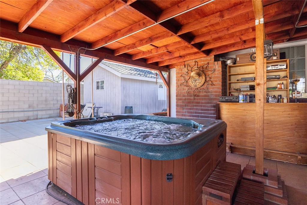 7414 Quartz Avenue Winnetka, CA 91306 - Photo 29 of 42 a view of a wooden chairs in a patio