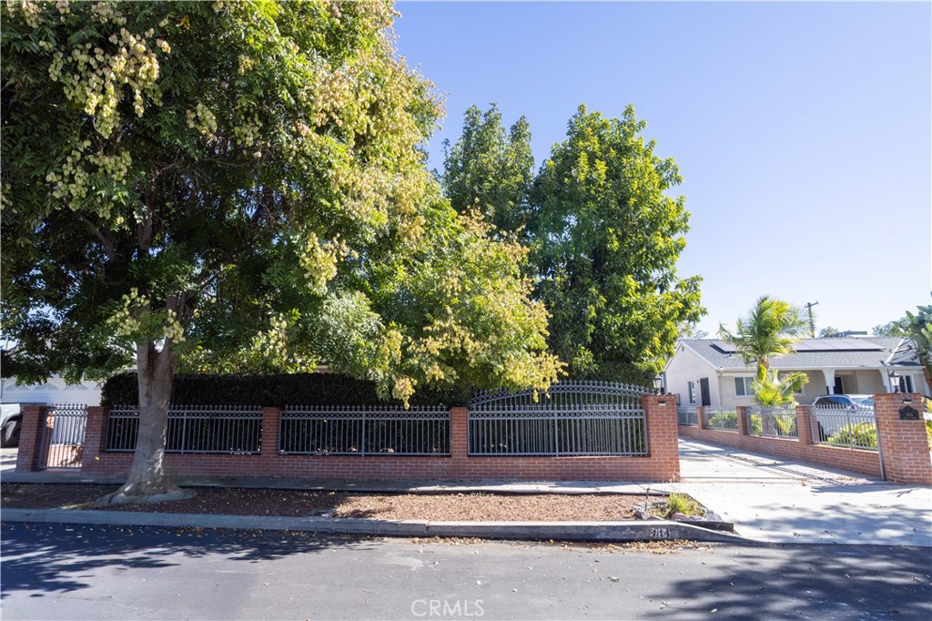 7414 Quartz Avenue Winnetka, CA 91306 - Photo 3 of 42 a view of street along with trees