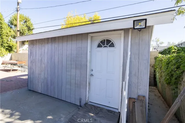 a view of a back yard of the house
