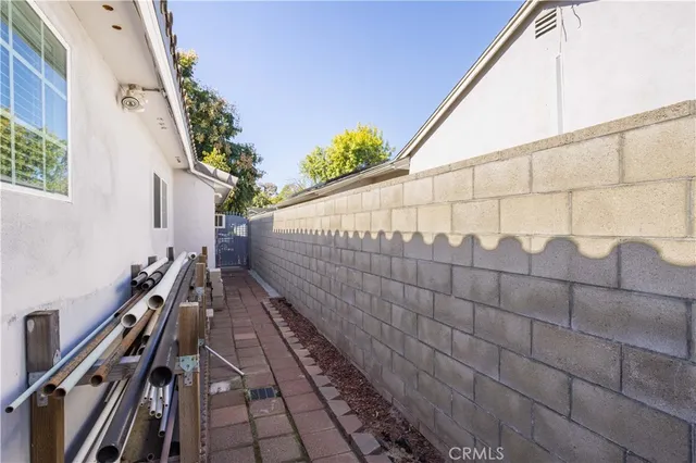 a view of balcony with wooden floor