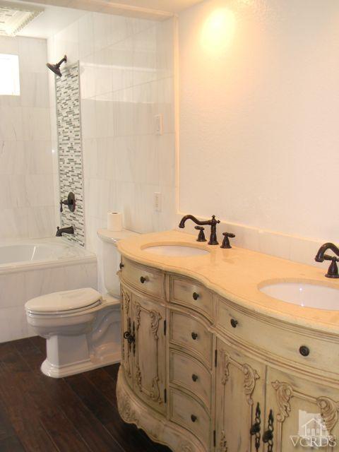 761 Congressional Road Simi Valley, CA 93065 - Photo 12 of 22 a bathroom with a sink a toilet and shower