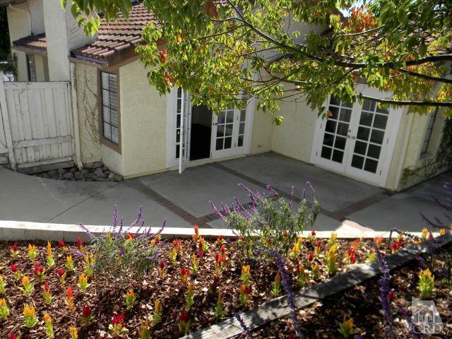 761 Congressional Road Simi Valley, CA 93065 - Photo 20 of 22 a view of a house with a yard and garden