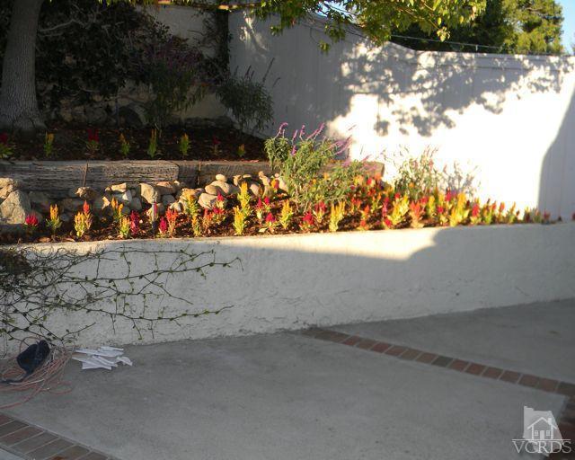 761 Congressional Road Simi Valley, CA 93065 - Photo 22 of 22 a view of water fountain with wooden fence