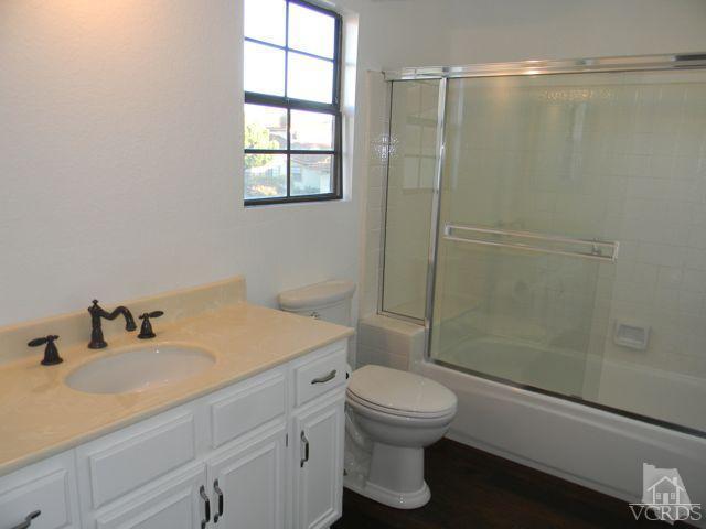 761 Congressional Road Simi Valley, CA 93065 - Photo 9 of 22 a bathroom with a sink toilet and shower