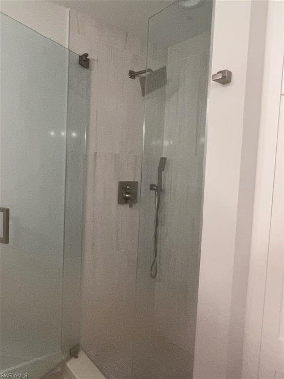 7713 Jewel Lane, Unit 202 Naples, FL 34109 - Photo 8 of 25 a bathroom with a shower