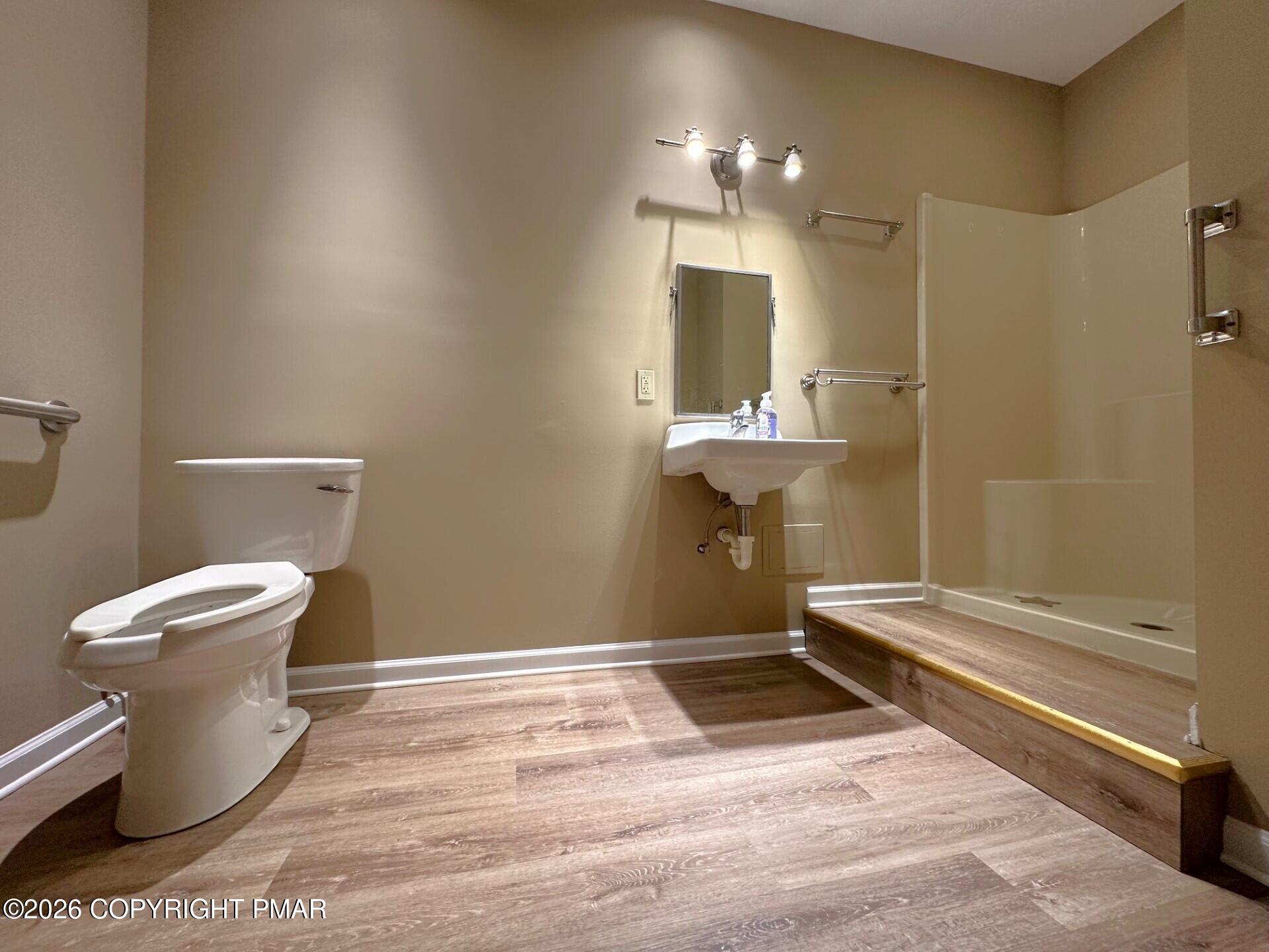 808 Interchange Road, Unit REAR Kresgeville, PA 18333 - Photo 5 of 8 a bathroom with a toilet and a shower