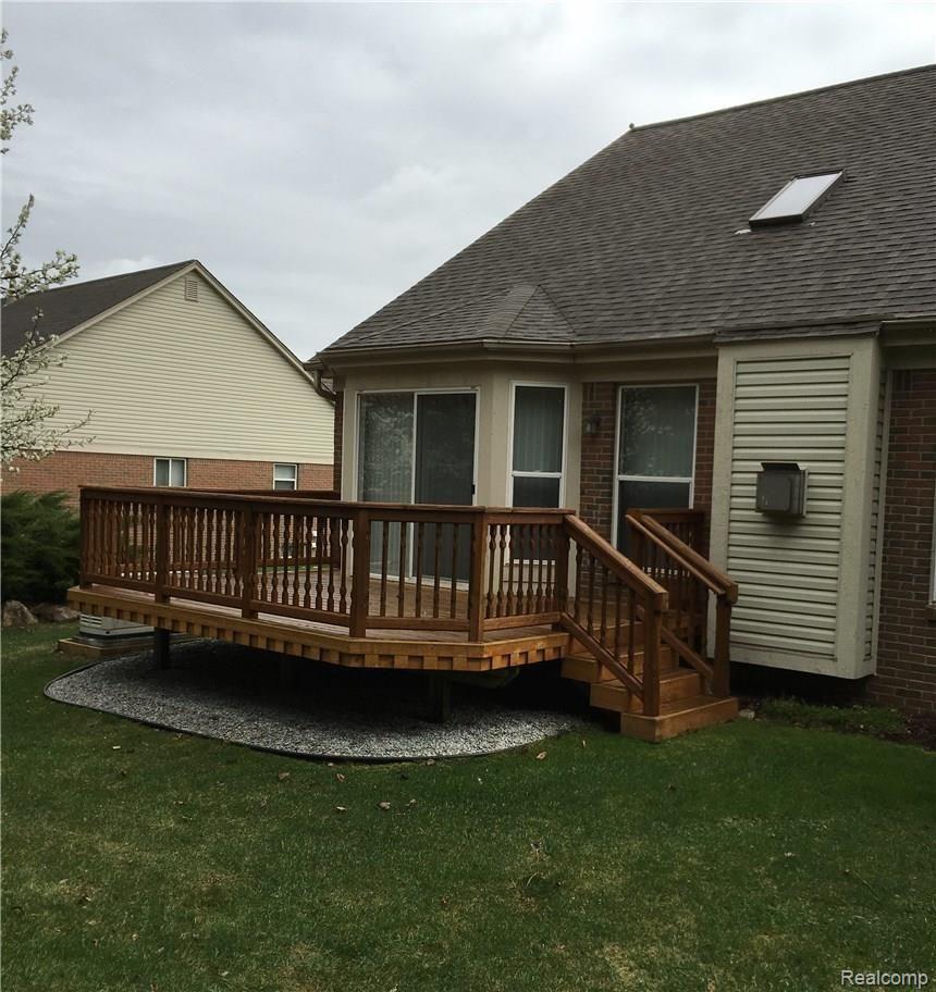 1060 Churchill Circle, Unit 27 Rochester, MI 48307 - Photo 2 of 20 Rear Elevation.jpg