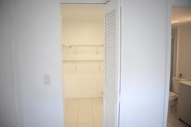 a bathroom with a white shower