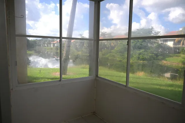 a bathroom with a glass door