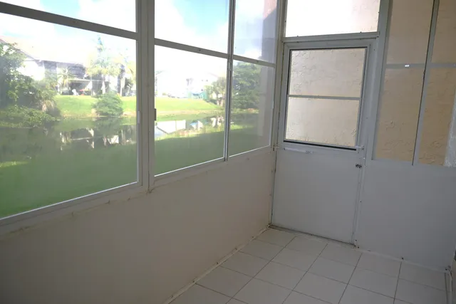 a view of a lake with a building in the background