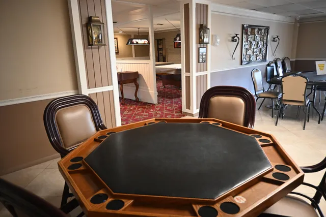 a view of a living room with bathroom