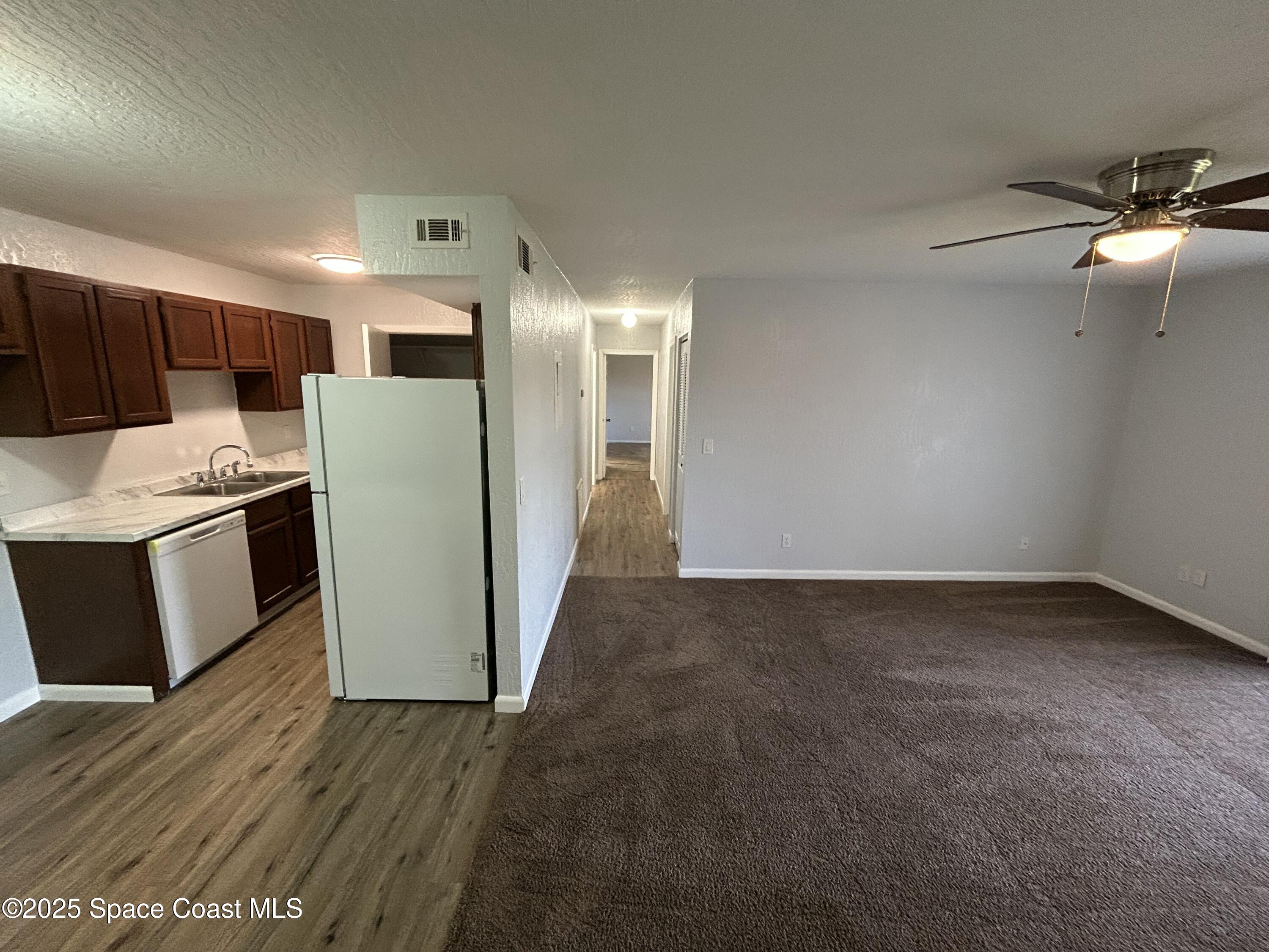 2101 Forest Knoll Drive Northeast, Unit 1206 Palm Bay, FL 32905 - Photo 3 of 18 F9142D88-B58B-438F-B853-26A39BBE52CA