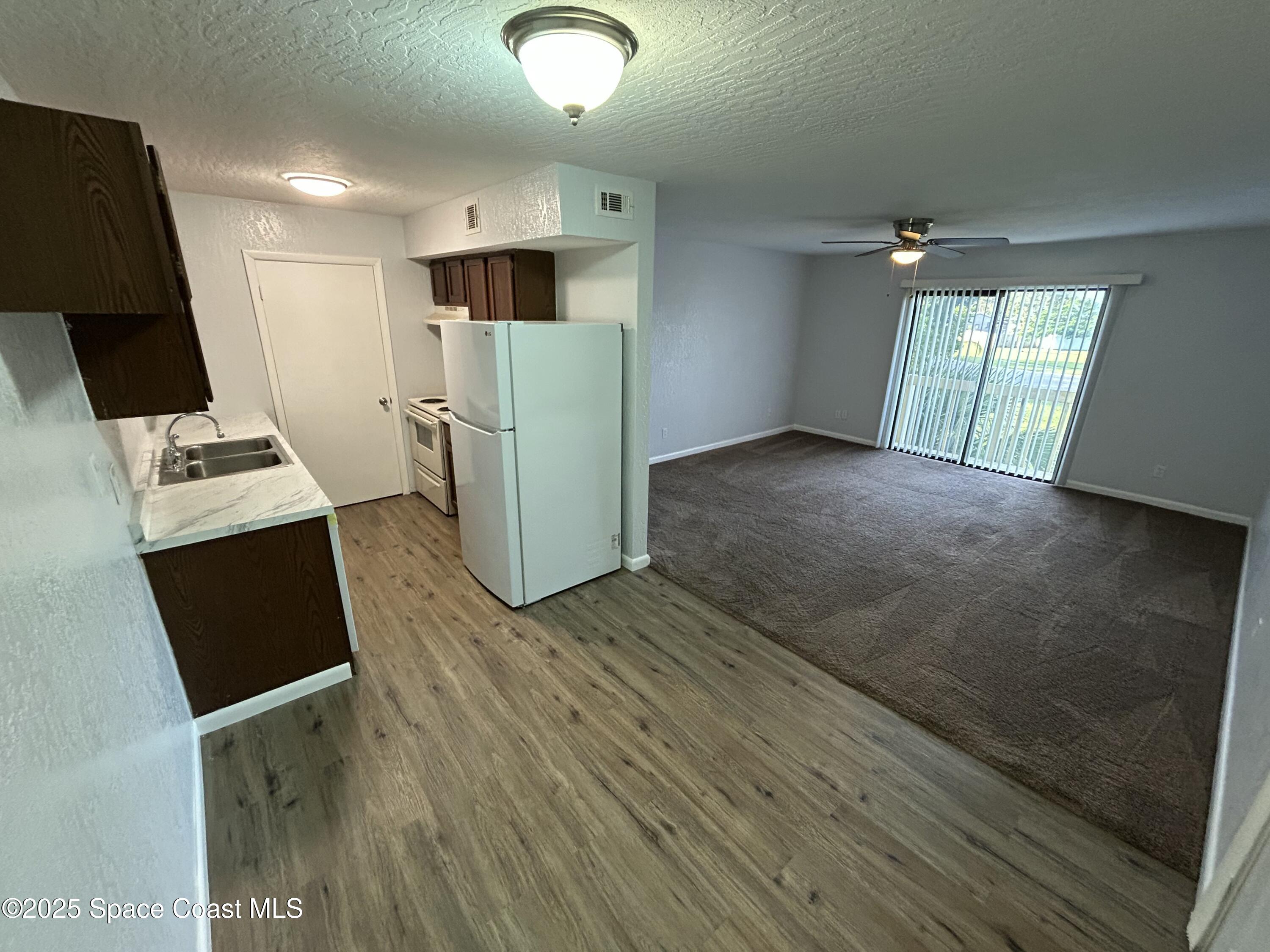 2101 Forest Knoll Drive Northeast, Unit 1206 Palm Bay, FL 32905 - Photo 4 of 18 A4A71B79-BC61-4A5D-93B4-3E3EF7D463F2