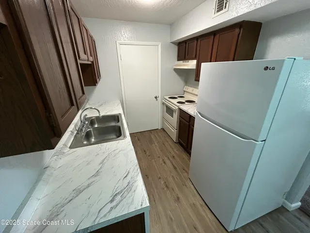 $1,400 | 2101 Forest Knoll Drive Northeast, Unit 1206, Palm Bay, FL 32905