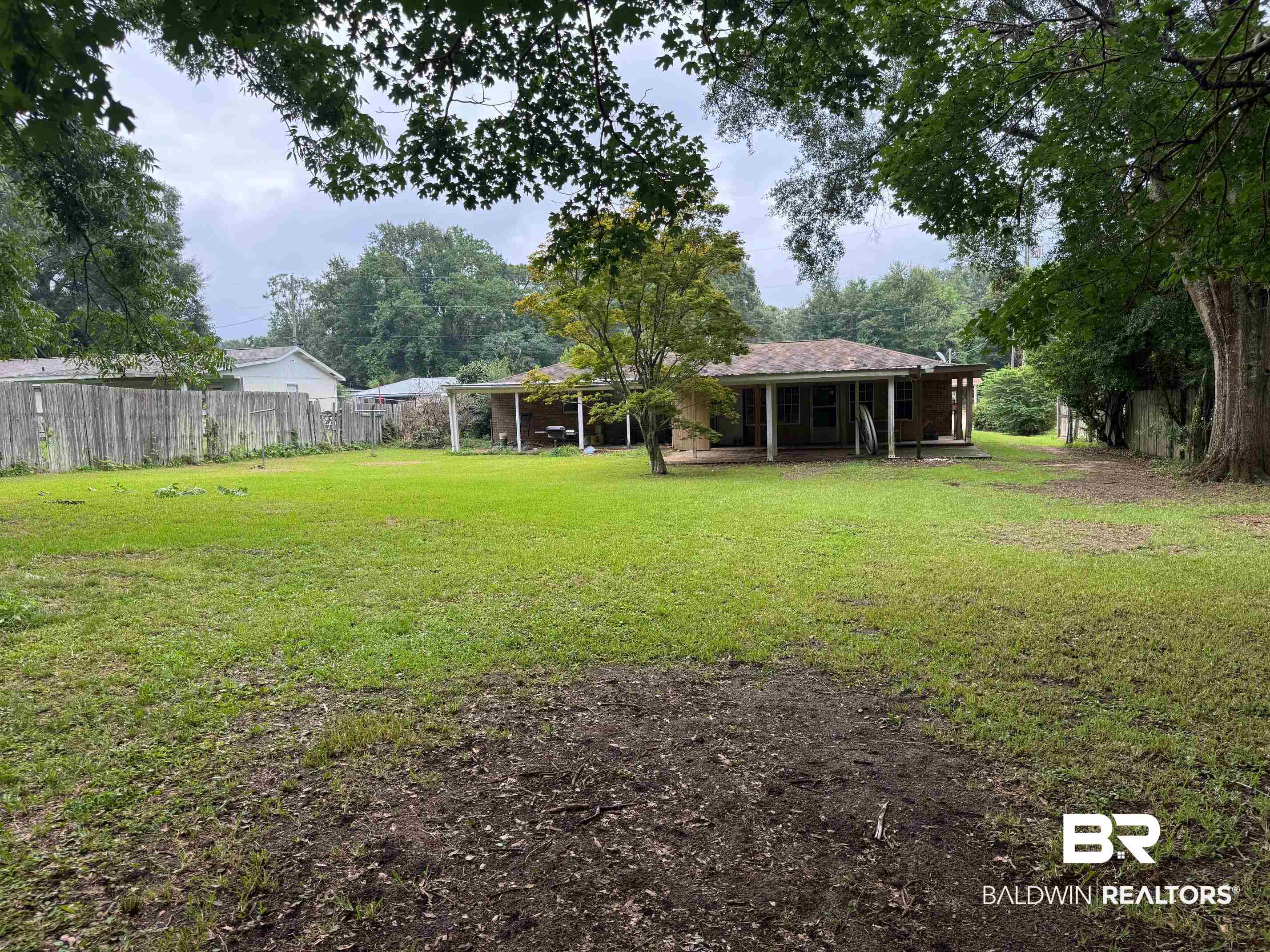 5198 Lancelot Drive Mobile, AL 36619 - Photo 26 of 30 View of yard featuring covered porch