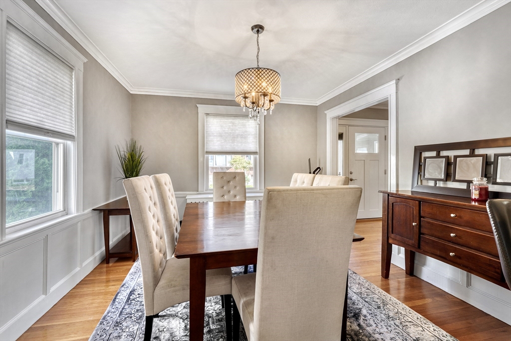 19 Gloria Road Boston, MA 02132 - Photo 13 of 42 a dining room with furniture window and wooden floor