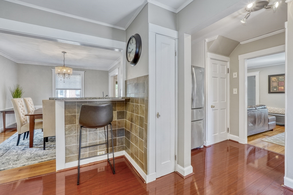 19 Gloria Road Boston, MA 02132 - Photo 17 of 42 a kitchen with stainless steel appliances granite countertop a stove and a refrigerator