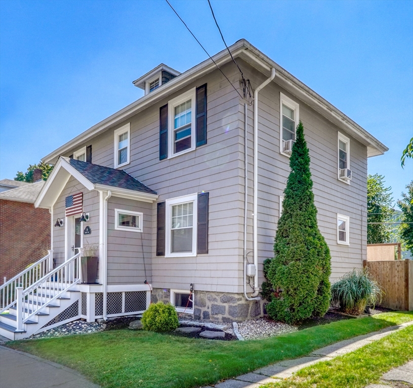 19 Gloria Road Boston, MA 02132 - Photo 2 of 42 a front view of a house with a yard