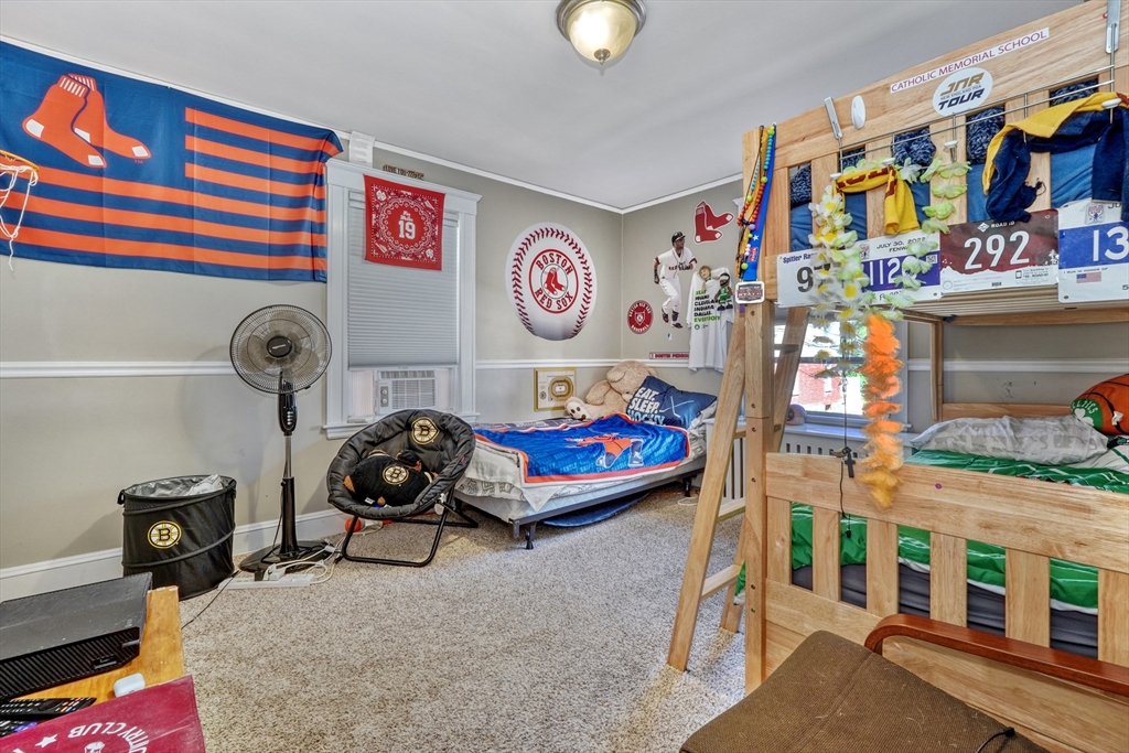 19 Gloria Road Boston, MA 02132 - Photo 25 of 42 a room with toys and a table