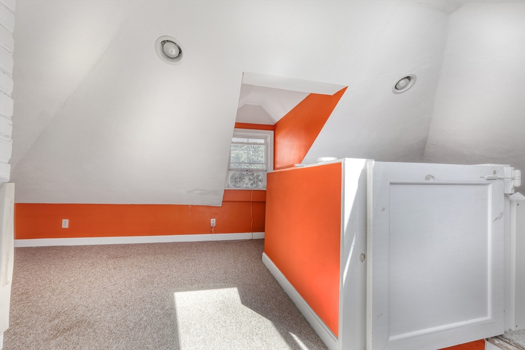 19 Gloria Road Boston, MA 02132 - Photo 28 of 42 a view of room with refrigerator and wooden floor