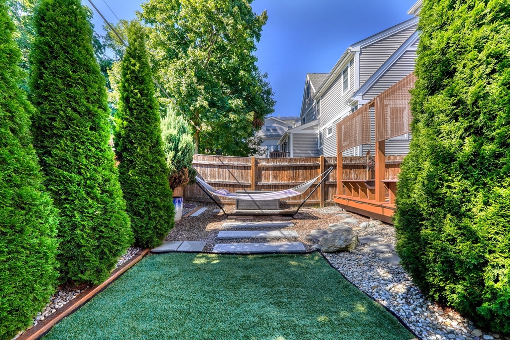 19 Gloria Road Boston, MA 02132 - Photo 35 of 42 a view of a backyard with sitting area