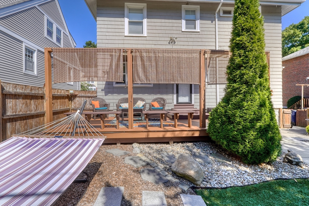 19 Gloria Road Boston, MA 02132 - Photo 36 of 42 a view of a backyard with sitting area