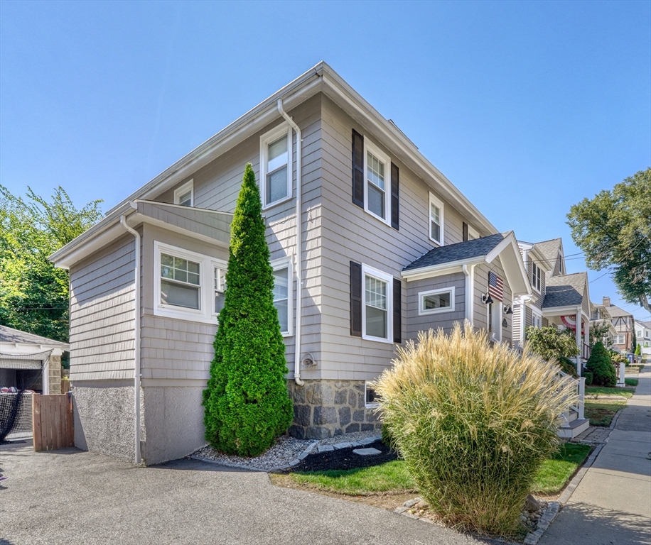 19 Gloria Road Boston, MA 02132 - Photo 38 of 42 a front view of a house with garden