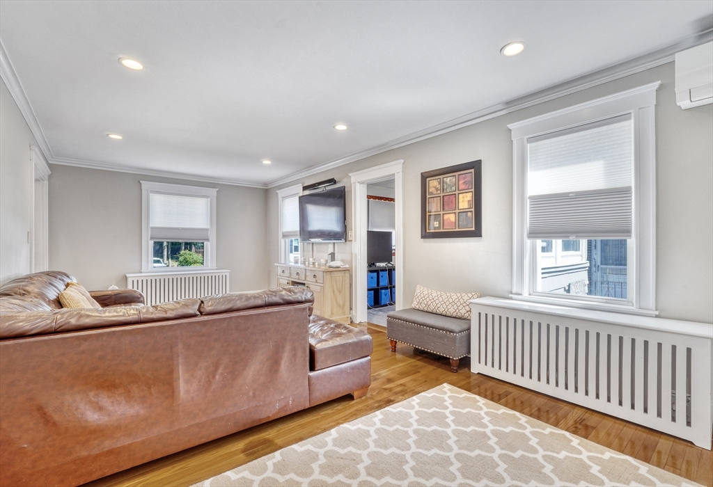 19 Gloria Road Boston, MA 02132 - Photo 9 of 42 a living room with furniture and a window