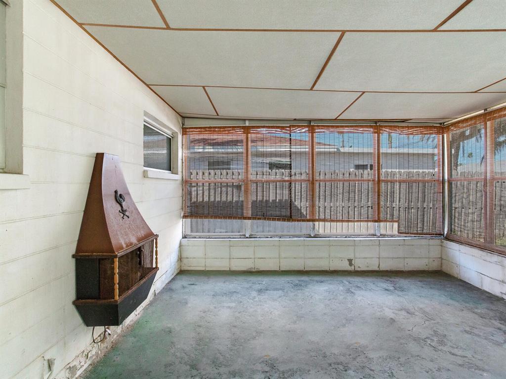 16105 1st Street East Redington Beach, FL 33708 - Photo 25 of 27 a view of an empty room with a staircase