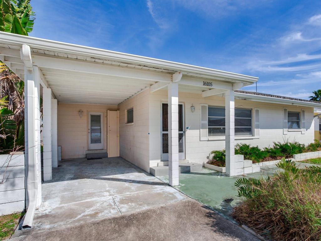 16105 1st Street East Redington Beach, FL 33708 - Photo 10 of 27 a view of a house with porch