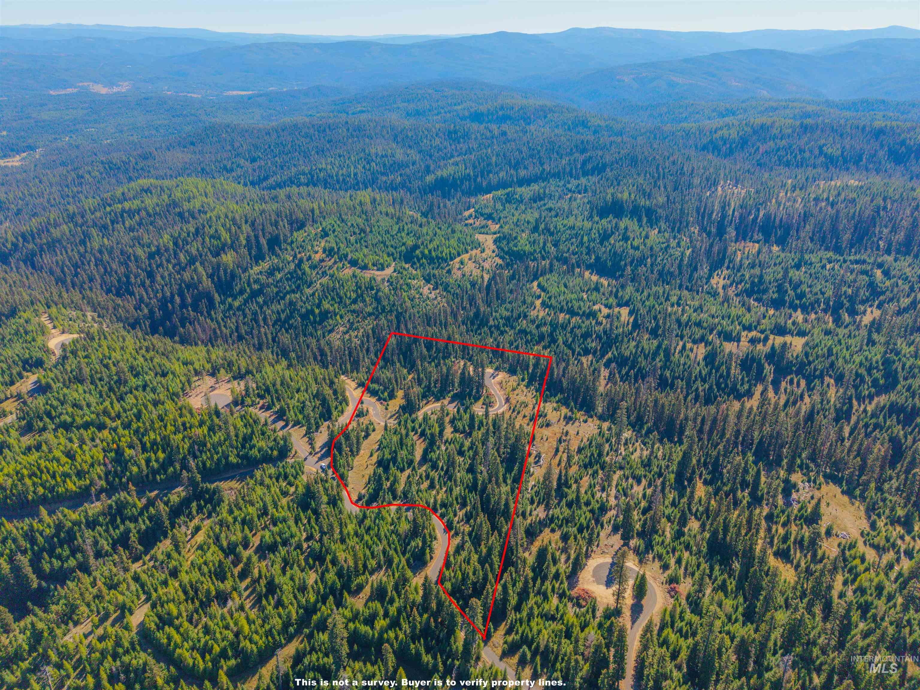 5 Tree Farm Trails Road Elk City, ID 83525 - Photo 12 of 13 Aerial overview of property's location featuring property parcel outlined and a mountain backdrop