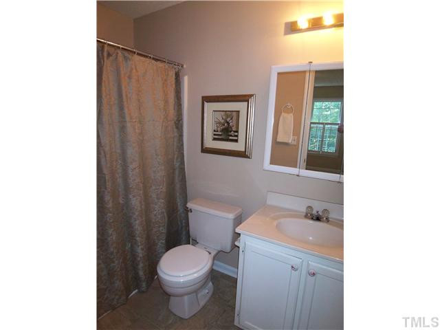 118 Timber Ridge Drive Durham, NC 27713 - Photo 7 of 12 Master bath has new flooring and nice storage in mirrored medicine cabinet! Master Bath/Spa