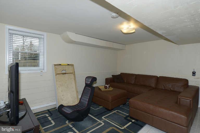 6023 Craig Street Springfield, VA 22150 - Photo 17 of 27 a living room with furniture