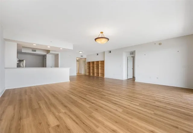 a view of kitchen with wooden floor
