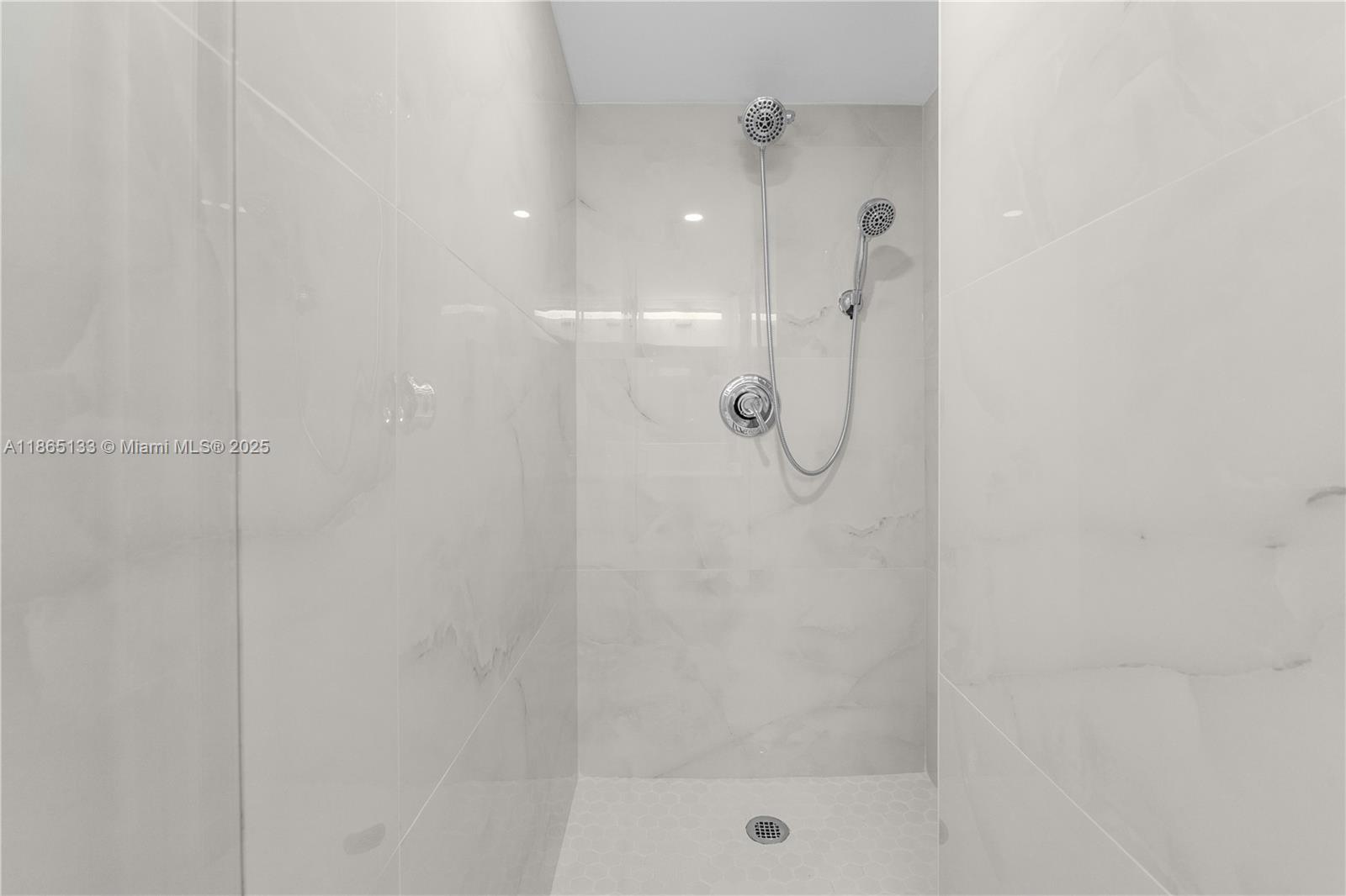 1331 Lincoln Road, Unit 1302 Miami Beach, FL 33139 - Photo 22 of 40 a bathroom with a shower