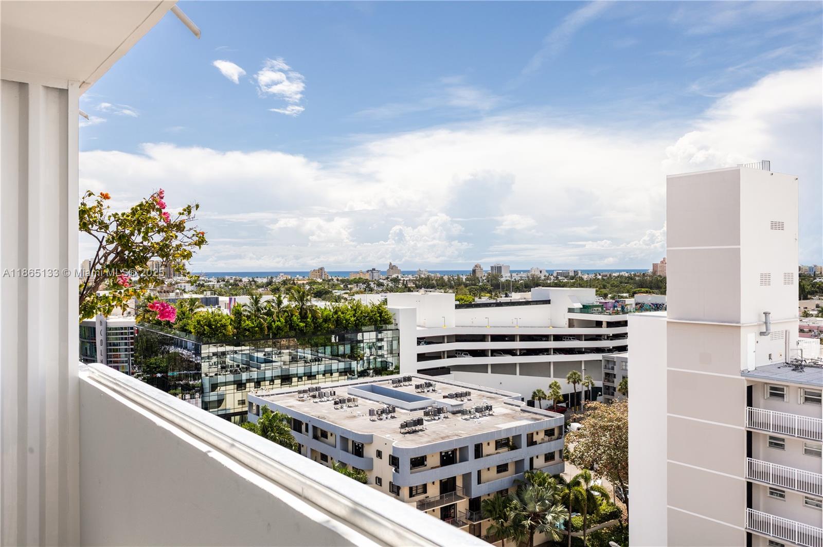 1331 Lincoln Road, Unit 1302 Miami Beach, FL 33139 - Photo 29 of 40 a view of a buildings from a balcony