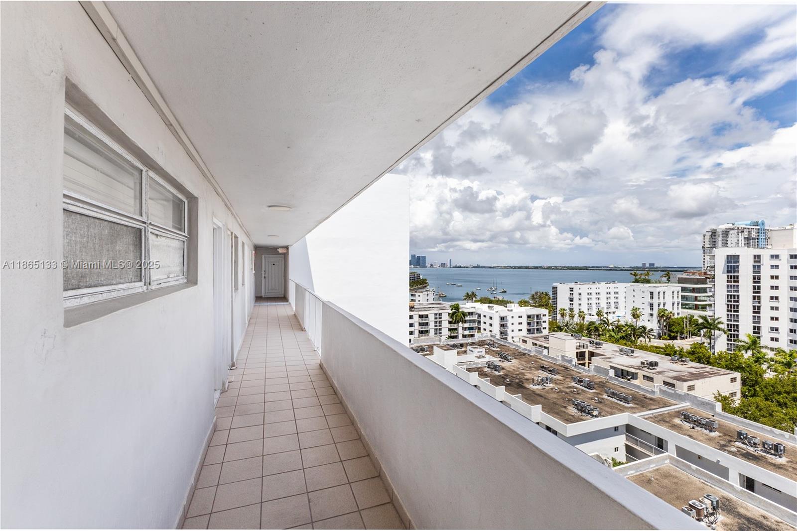 1331 Lincoln Road, Unit 1302 Miami Beach, FL 33139 - Photo 31 of 40 a city view from a balcony