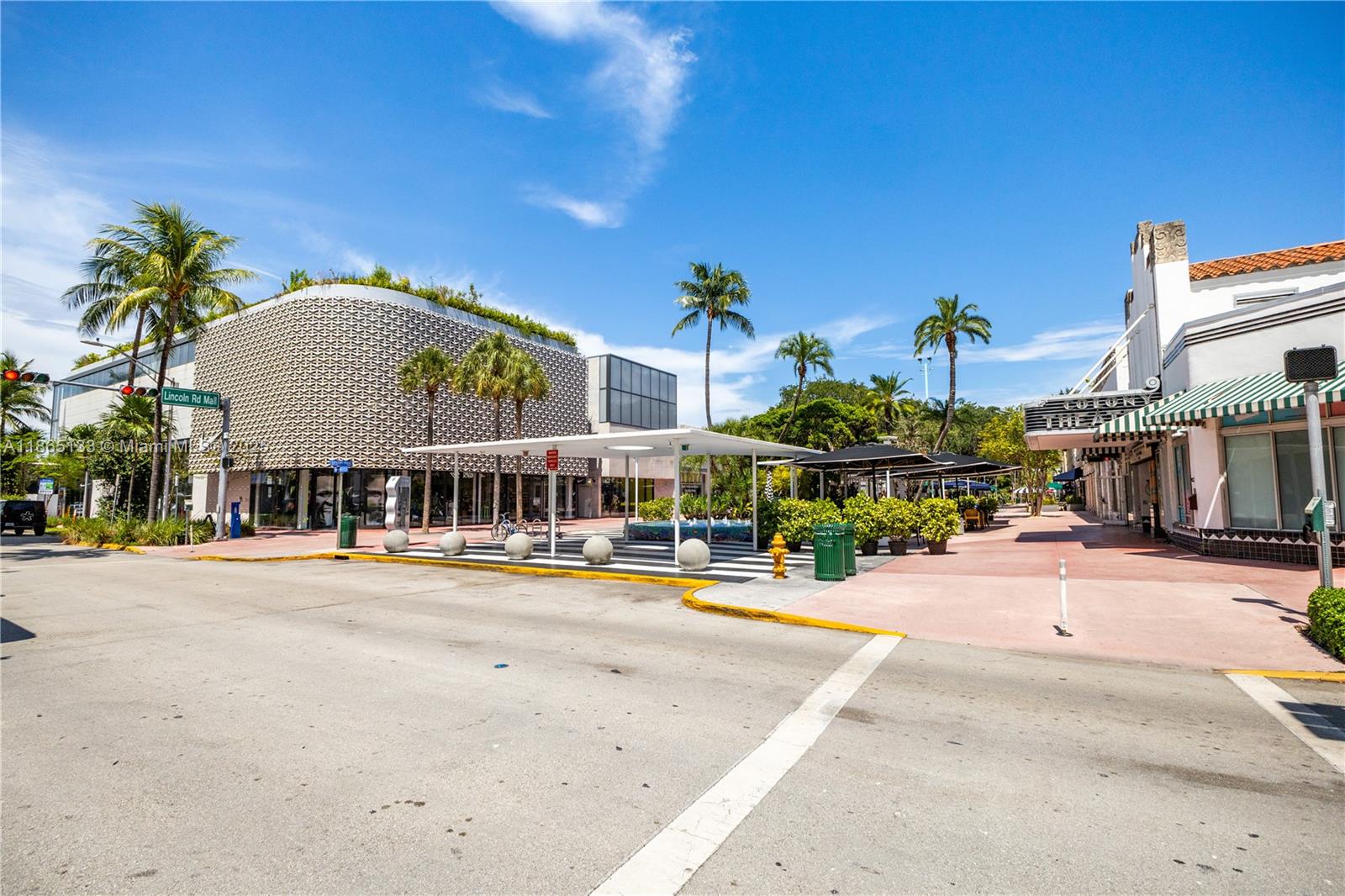 1331 Lincoln Road, Unit 1302 Miami Beach, FL 33139 - Photo 36 of 40 a front view of a building with sitting area
