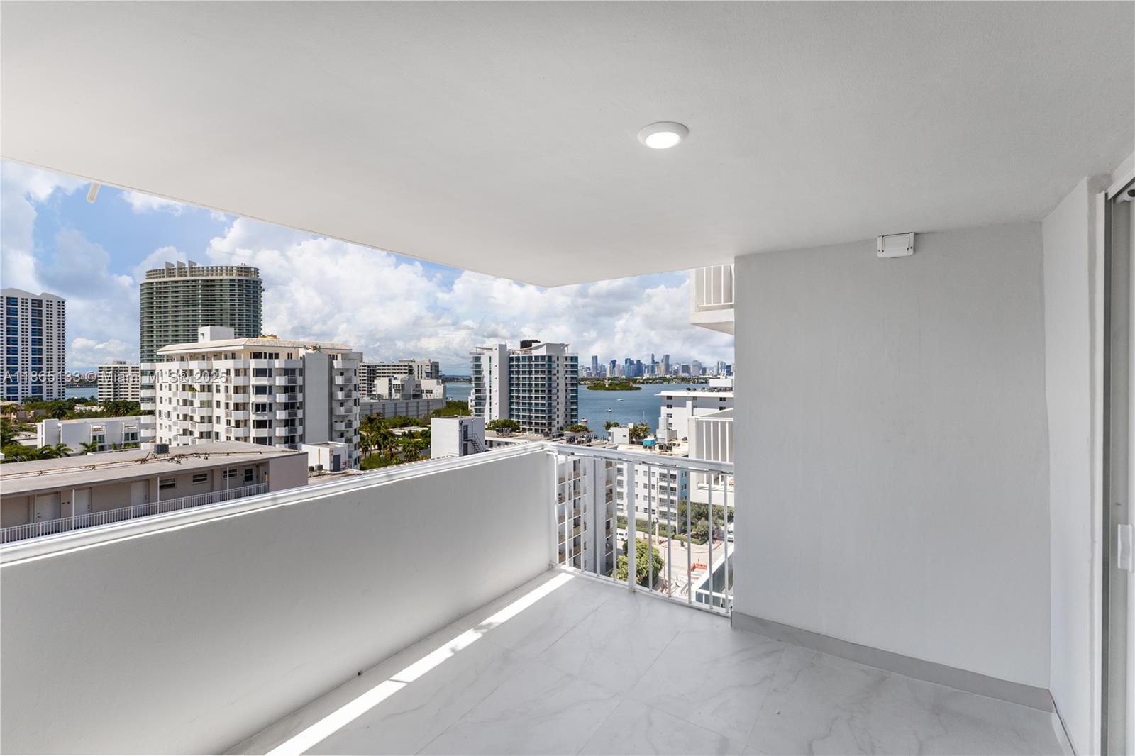 1331 Lincoln Road, Unit 1302 Miami Beach, FL 33139 - Photo 38 of 40 a view of a city from a living room