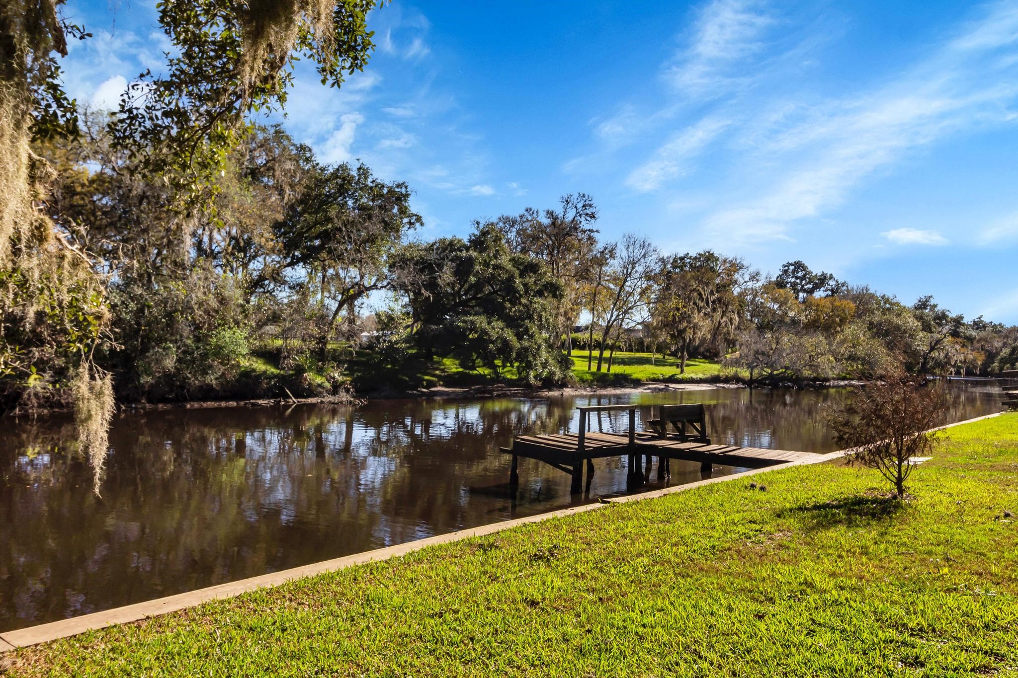 295 County Road 687 Angleton, TX 77515 - Photo 12 of 38 a view of a lake from a lake