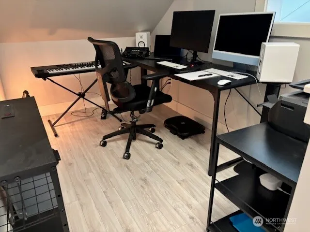 a view of a workspace with furniture