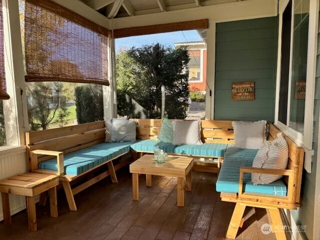 a outdoor living space with furniture and a potted plant