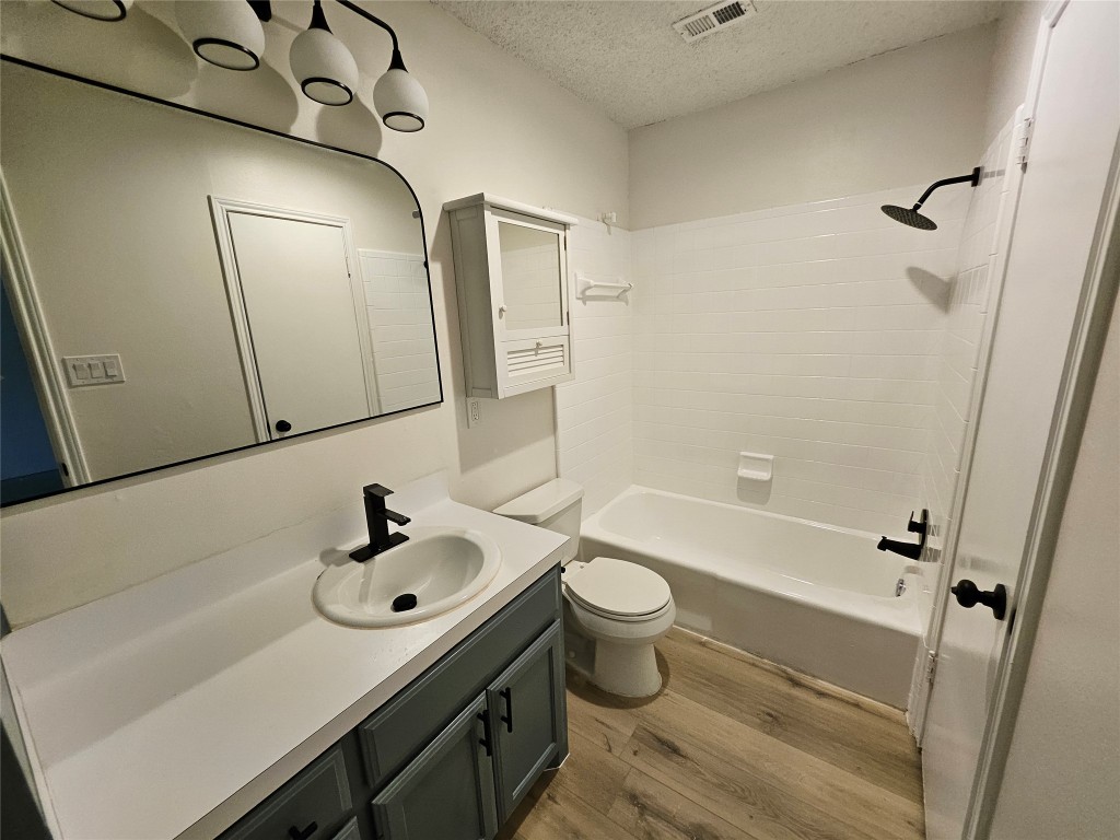 6806 Old Quarry Lane Austin, TX 78731 - Photo 22 of 29 a bathroom with a sink and a mirror