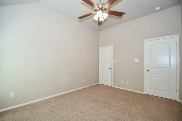 a view of a room with racks on the wall